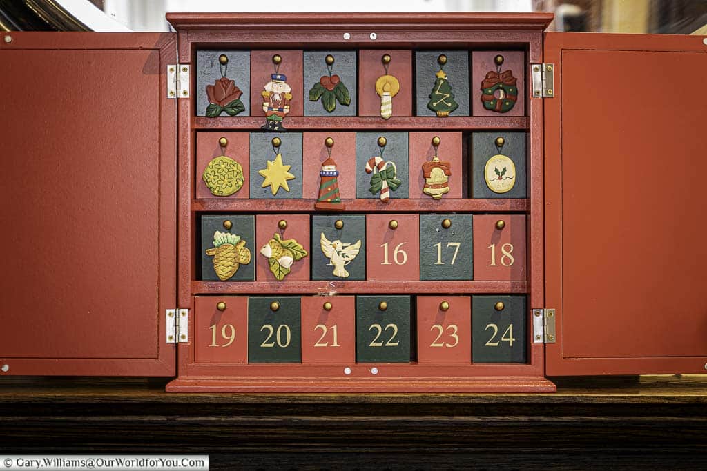 The door to our wooden advent calendar from las vegas completed up to the 16th of december, with just over a week left to christmas