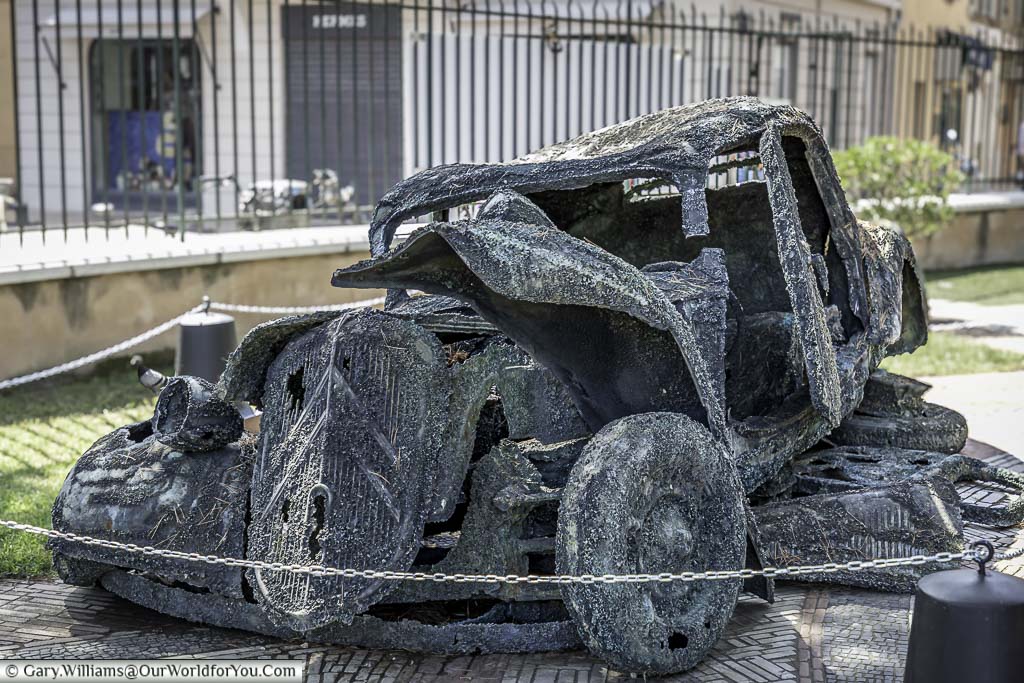 An art exhibit of a crumpled 1930's citroen in saint tropez in the south of france