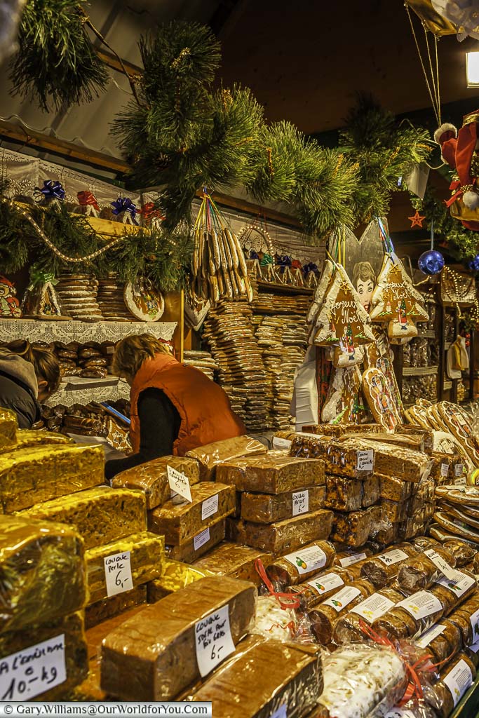 A gingerbread stall stacked with different tyes on strasbourg's christmas markets