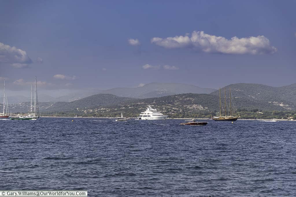 a mixture of craft on the open waters of the gulf of st tropez