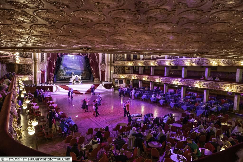 The view of the dancefloor from the first tier, with the seating area at one end, and the stage at the other of Tower Ballroom Blackpool