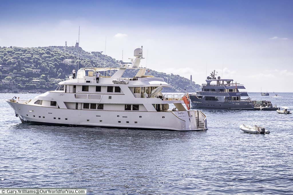 A couple of expensive motor yachts in the bay of Villefranche-sur-Mer