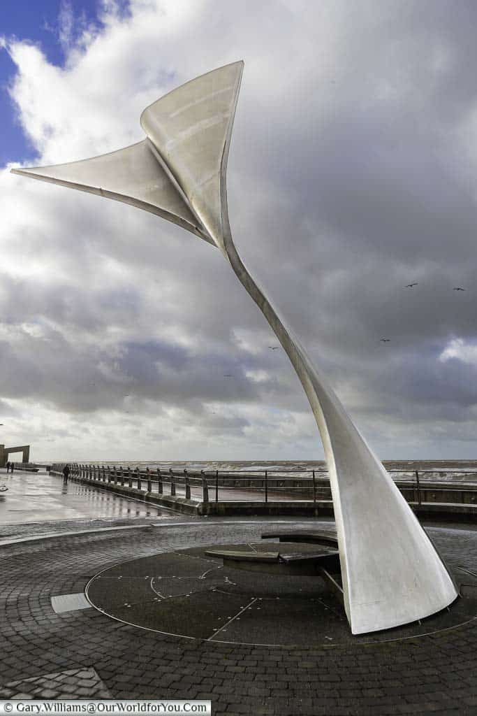 A large stainless steel artwork, known as 'The Fin', on Blackpool's seafront.
