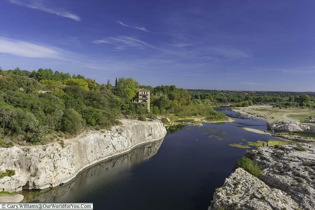 A view of the river gardon from the pont du gard as it manders through the rocky landscape of provence in southern france