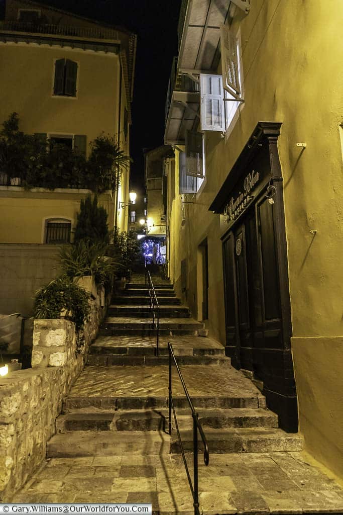 Steps up a narrow lane in Villefranche-sur-Mer at night