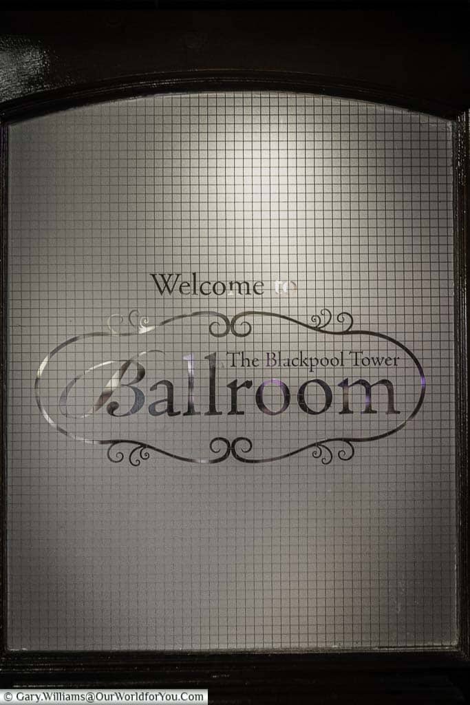 'Welcome to the Tower Ballroom' etched onto the opaque glass window in the door that leads to the Blackpool Tower Ballroom.