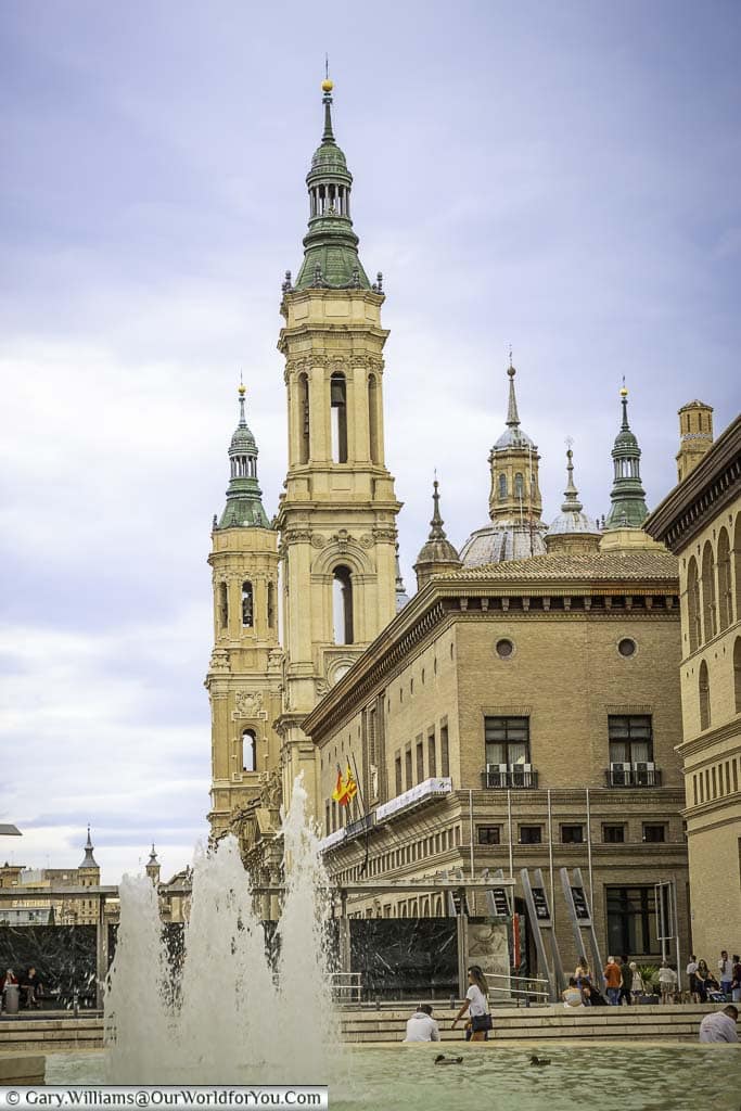 the ayuntamiento de zaragoza as seen from the plaza la seo with the towers of the cathedral-basilica of our lady of the pillar in the background