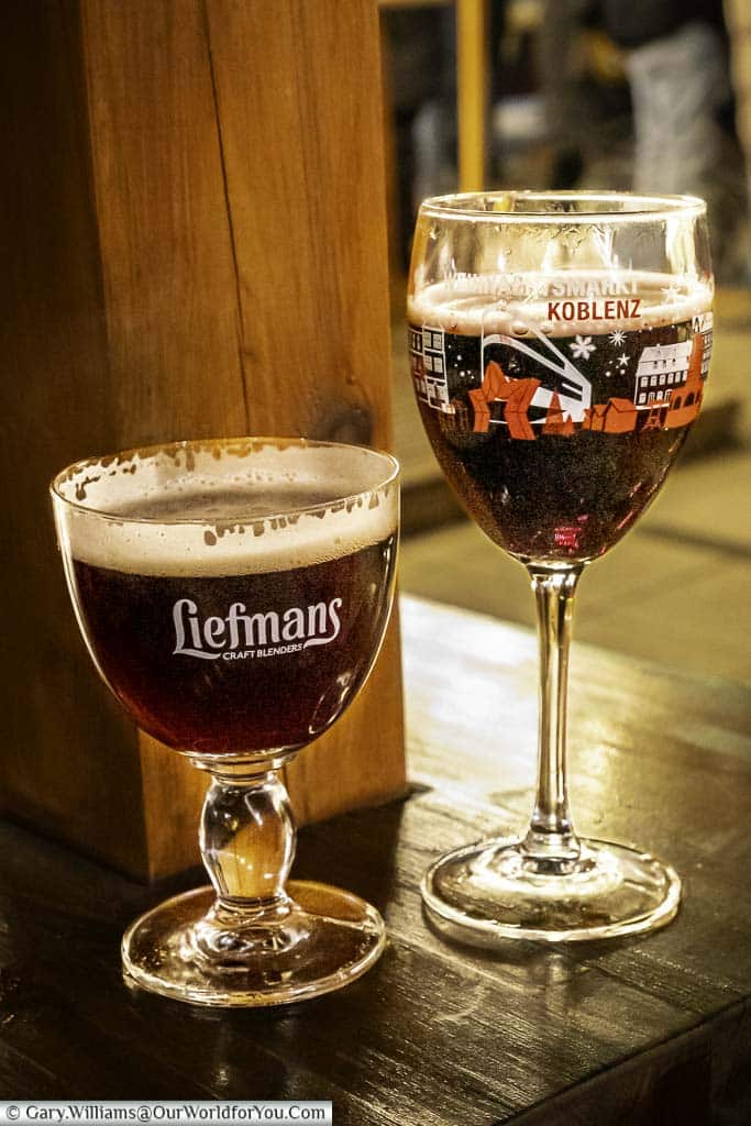 A goblet of warm spiced beer and a wind glas of mulled wine on Koblenz's Christmas Markets