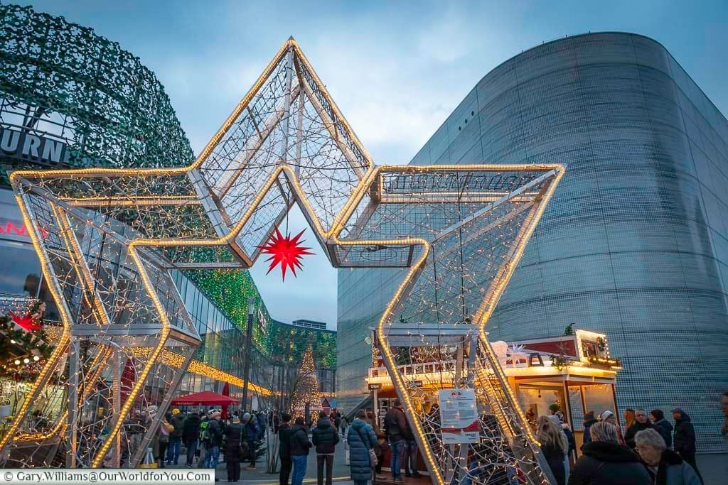 The illuminated star at the entrance to the zentralplatz christmas market in koblenz