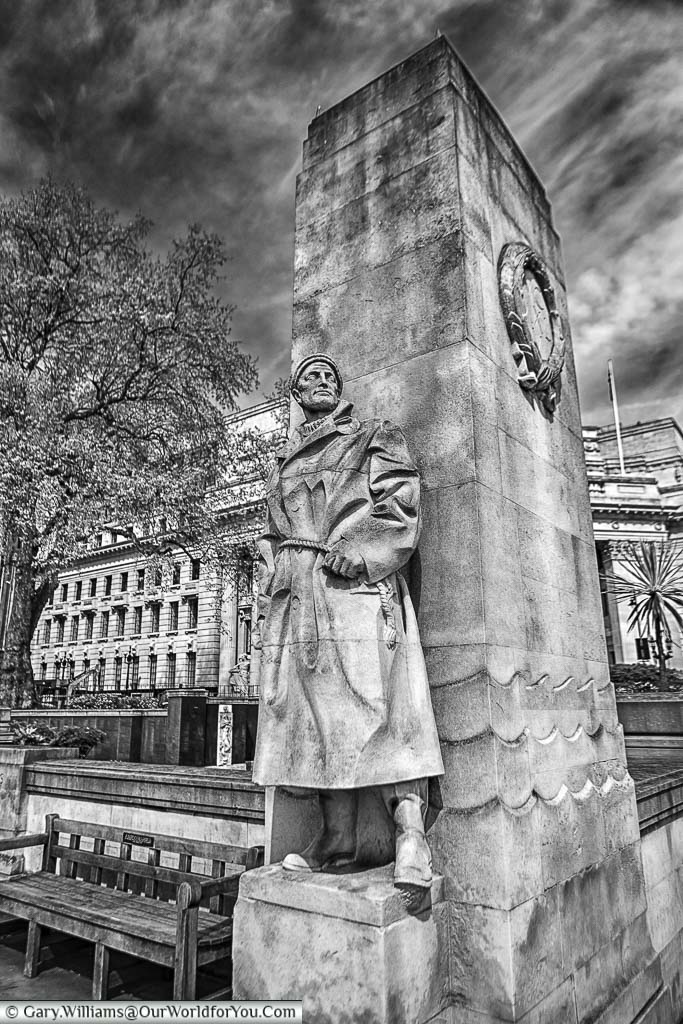 A black & white image of one of the stone Seaman at the Tower Hill Memorial in Trinity Memorial Gardens on Tower Hill