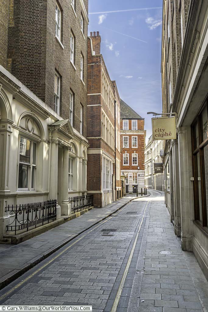 A view along ironmonger lane on a quiet saturday morning in the city of london