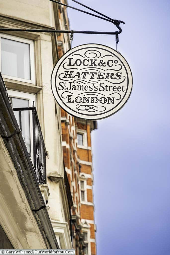 The sign for Lock & Co. Hatters, hanging from their shop, on St James's Steet in the City of Westminster, London