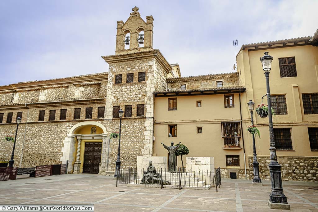 The padre polanco monument in front of the convent of santa clara in the plaza de cristo rey in teruel, spain