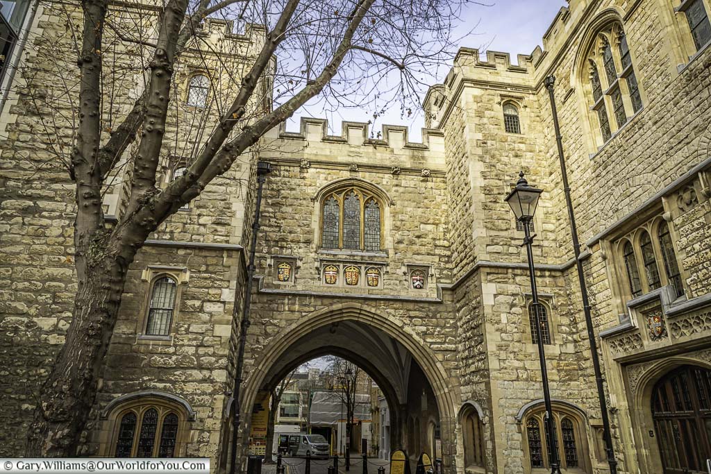 The restored historic stone saint john's gate with it's crenellated tops in clerkenwell, london