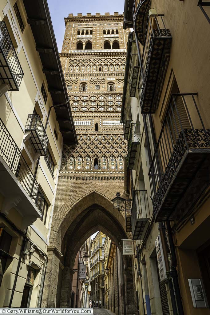 A view along calle el salvador under the mudéjar church tower of el salvador de teruel in spain