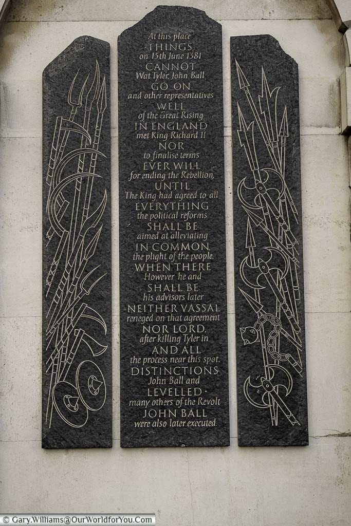 An engraved slate memorial stone to Wat Tyler and John Ball in the smithfield district of the city of london