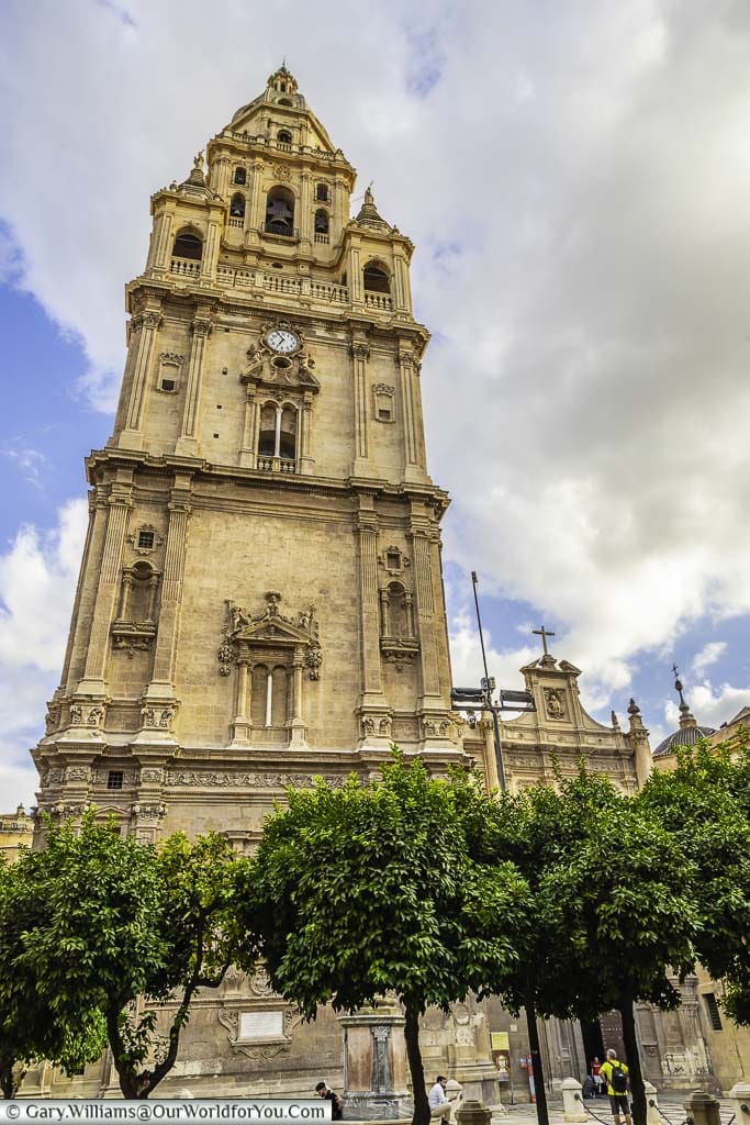 The bell tower of murcia cathedral as seen from the plaza hernández amores in murcia, spain
