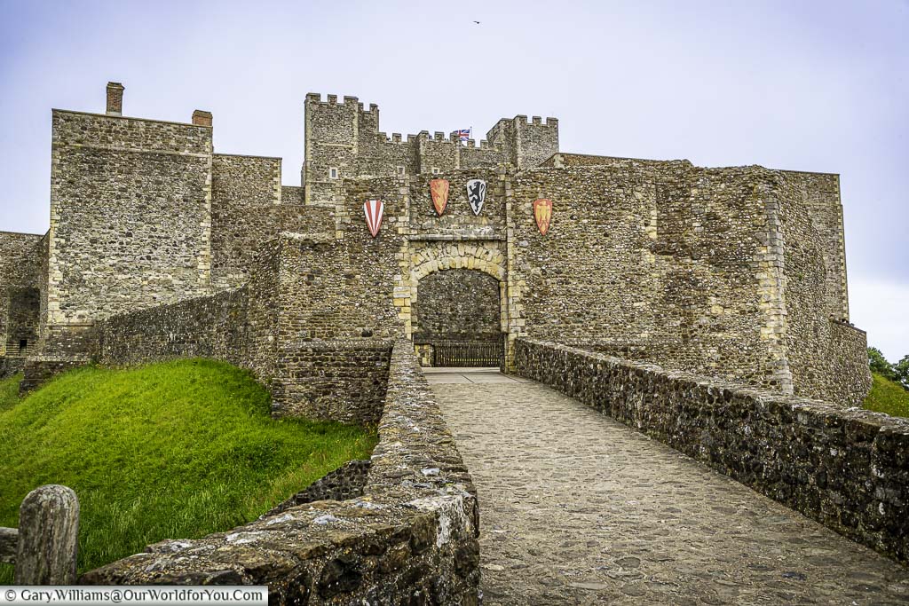 A stone pathway leading to one gated entrance in the walls of the english heritage dover castle