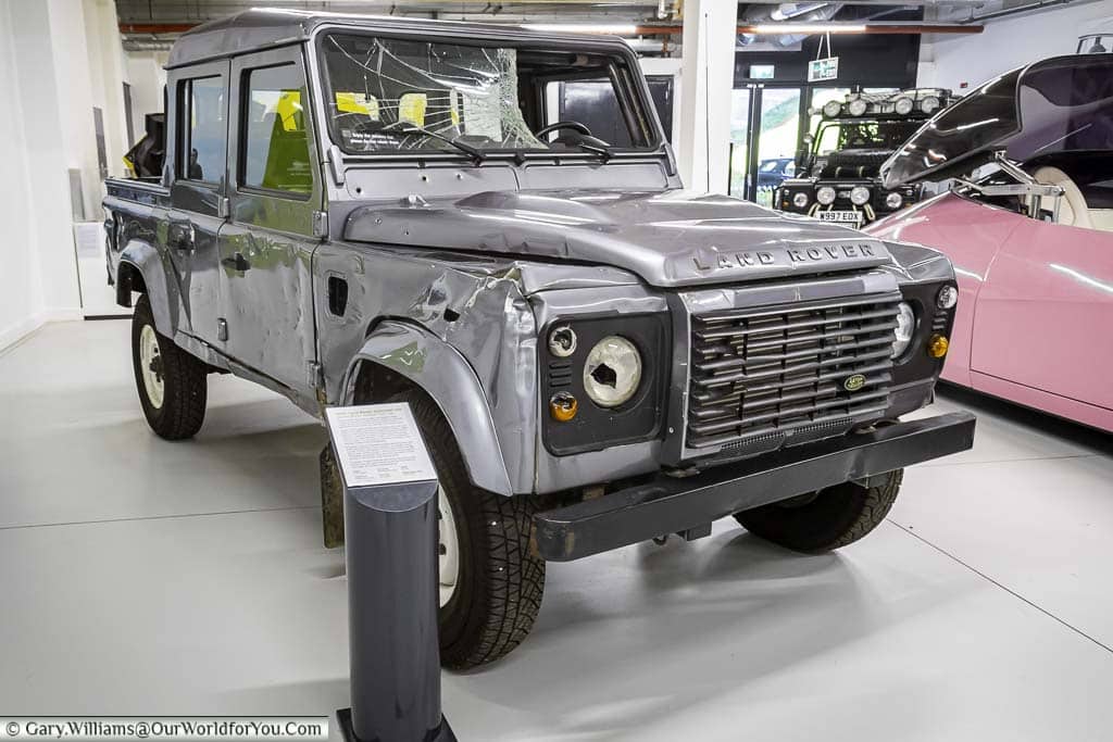 One of the Land Rover 90s from the James Bond movie 'Skyfall' featuring the scars of the chase sequence
