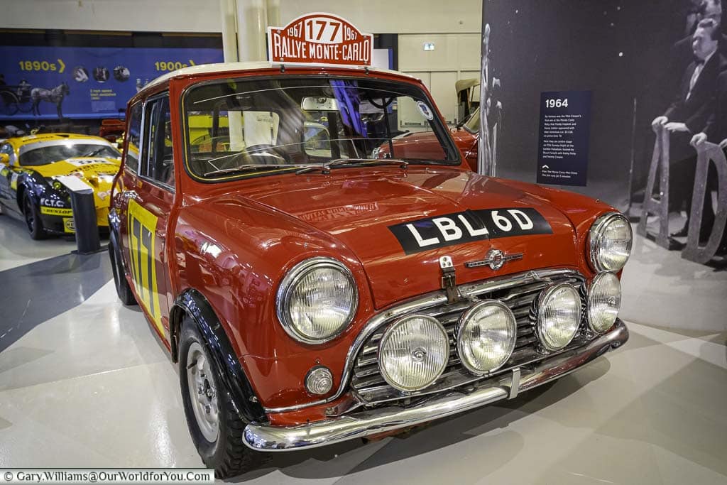 Paddy Hopkirk's bright red Mini Cooper that won the Monte Carlo rally on display in the British motor museum.
