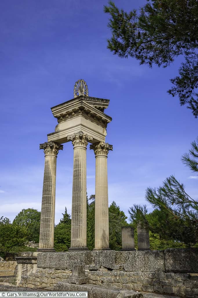 Three columns and a corner of the remains of one temples at the archaeological site of glanum in the provence region of france