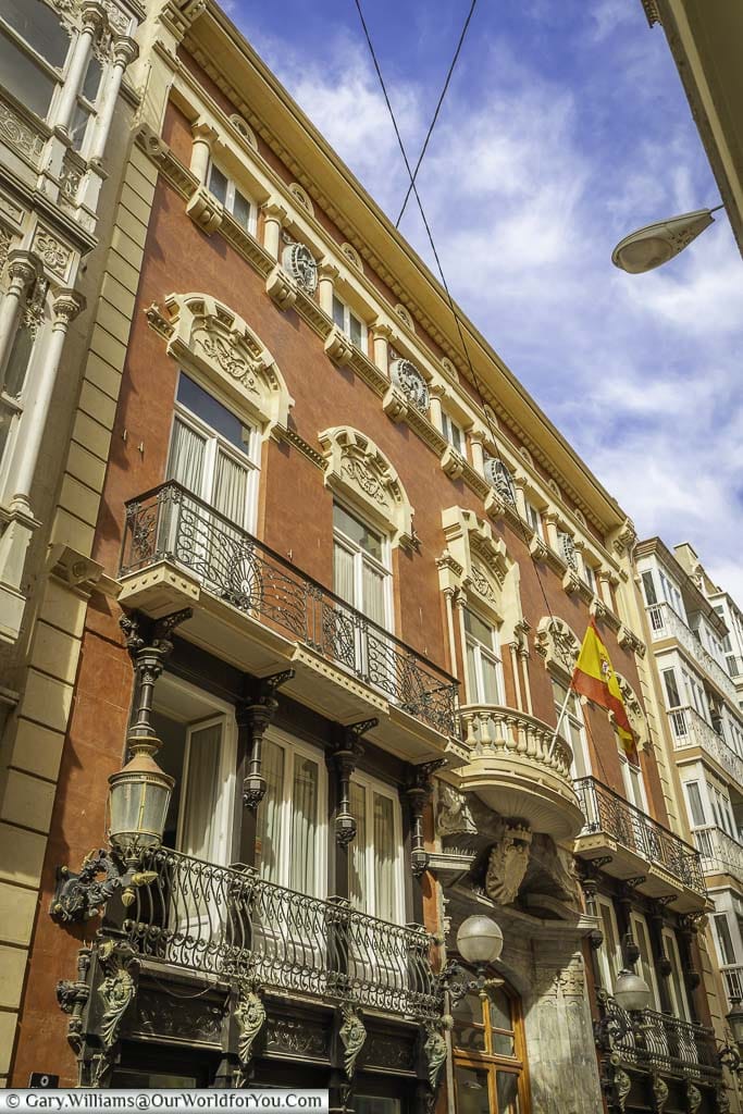 The terracotta coloured ornate modernist facade of the casino de cartagena on calle mayor in cartagena in southern spain