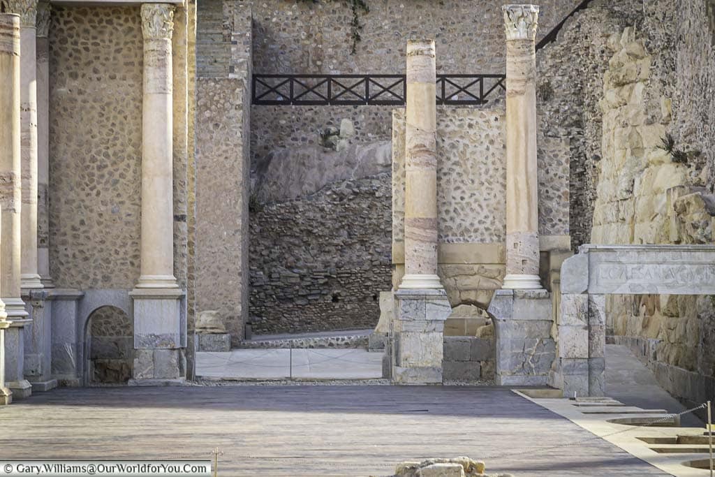 a close-up of the stage of the roman theatre in cartagena with it's ancient stone columns