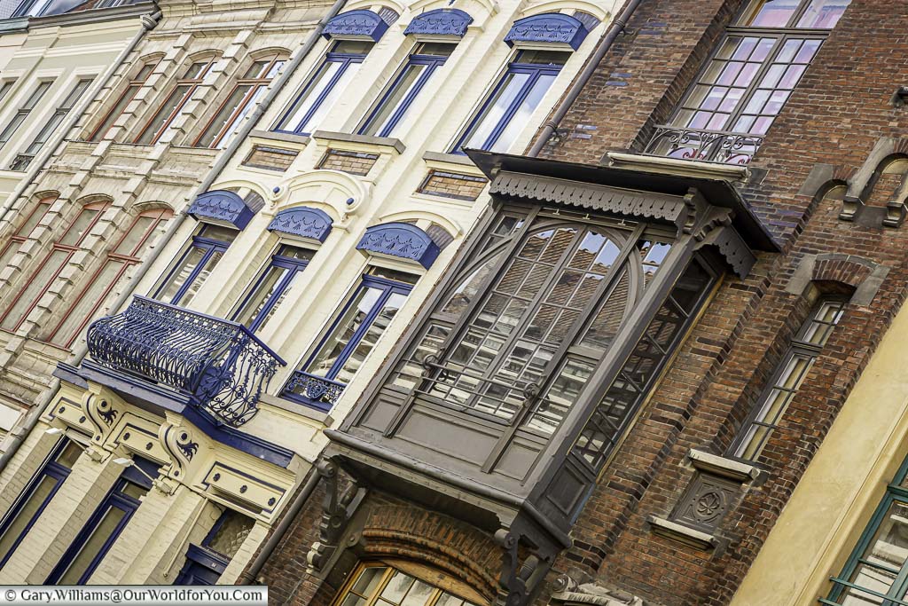 Architectural details including balconies and window surrounds in Lille, Northern France