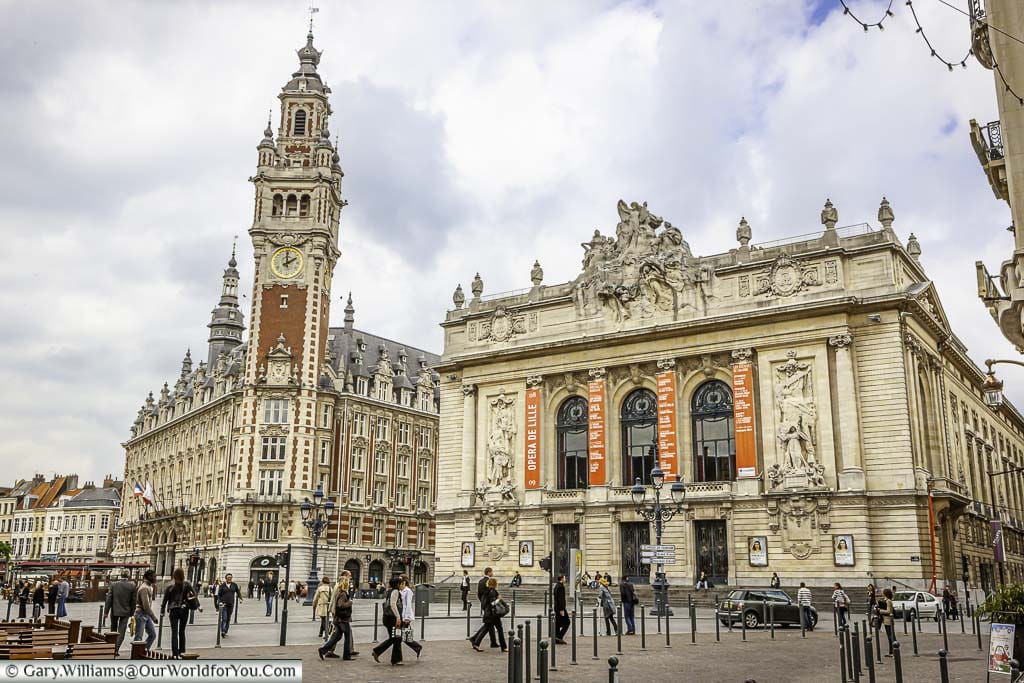 The Opéra de Lille in Place du Théâtre next to Belfry of the Chamber of Commerce in Lille.